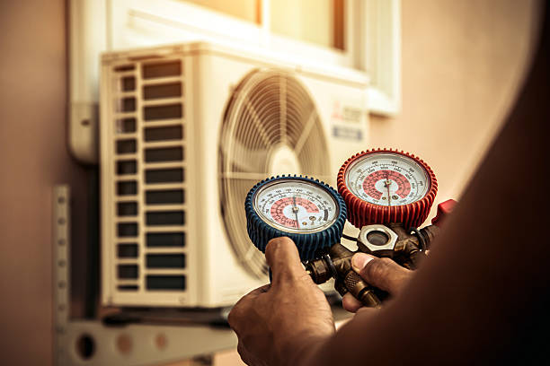 Professional Heat Pump Repair technician working in Crockett, TX